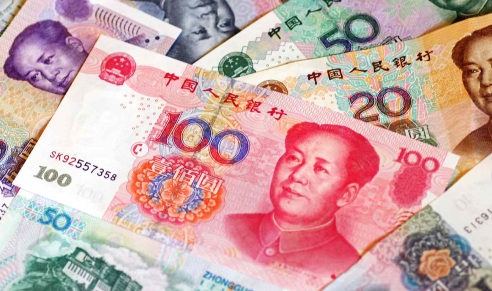 Various Chinese yuan banknotes featuring Mao Zedong.