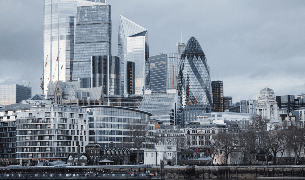 London cityscape with iconic skyscrapers on a cloudy day.