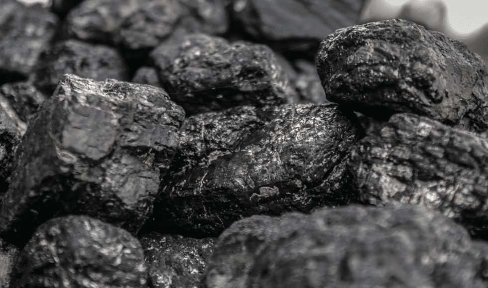 Close-up of irregular black coal pieces.